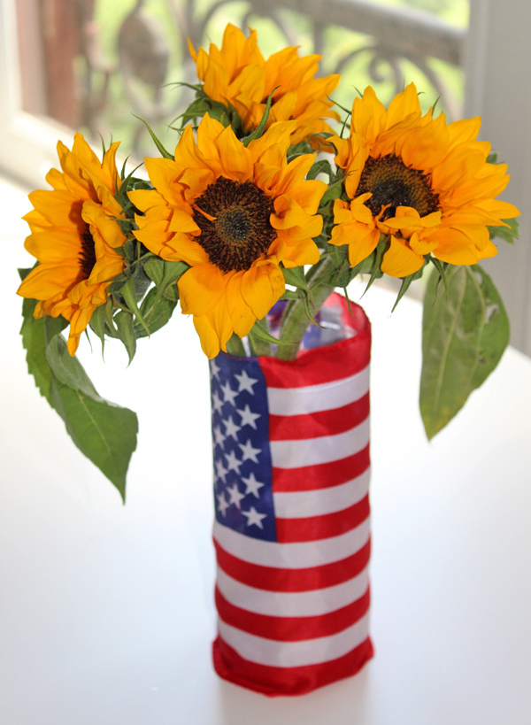 DIY 4th of July Decorations with red white and blue vase with sunflowers